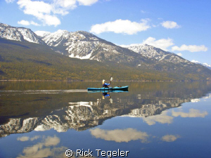 Winter kayaking on Slocan Lake. by Rick Tegeler 